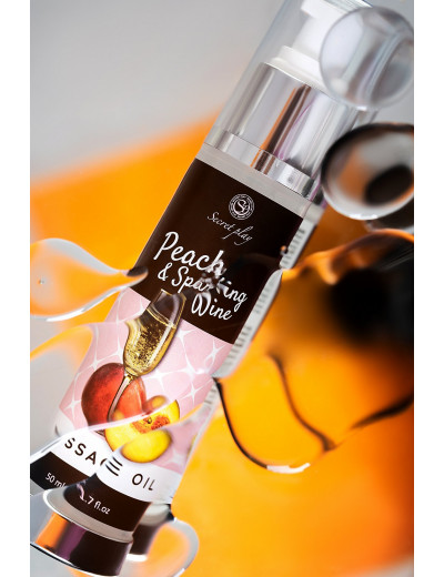 Массажное масло Secret Play с ароматом персика и шампанского 50 мл 3682